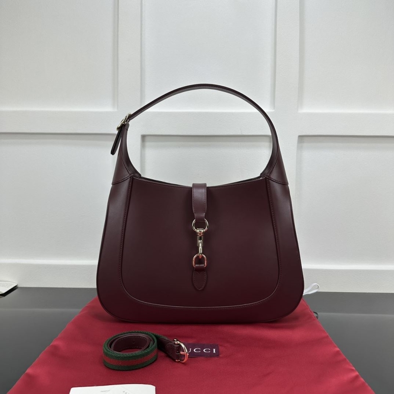 G*u*i top handle bags